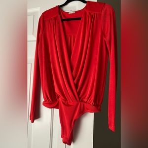 Free People Turnt Bodysuit. Color Bella Rosa. Sz. M